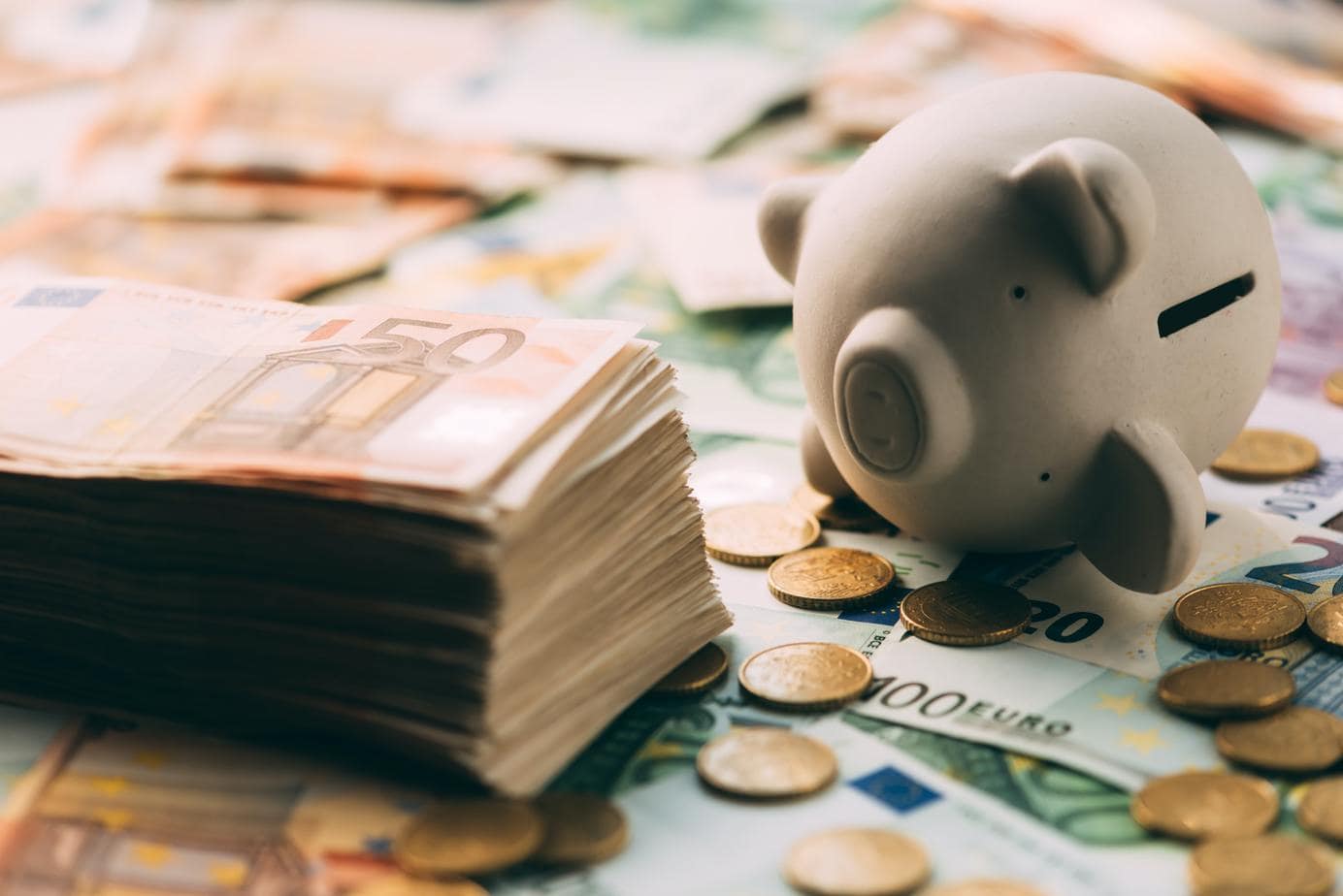 Piggy moneybox with euro cash