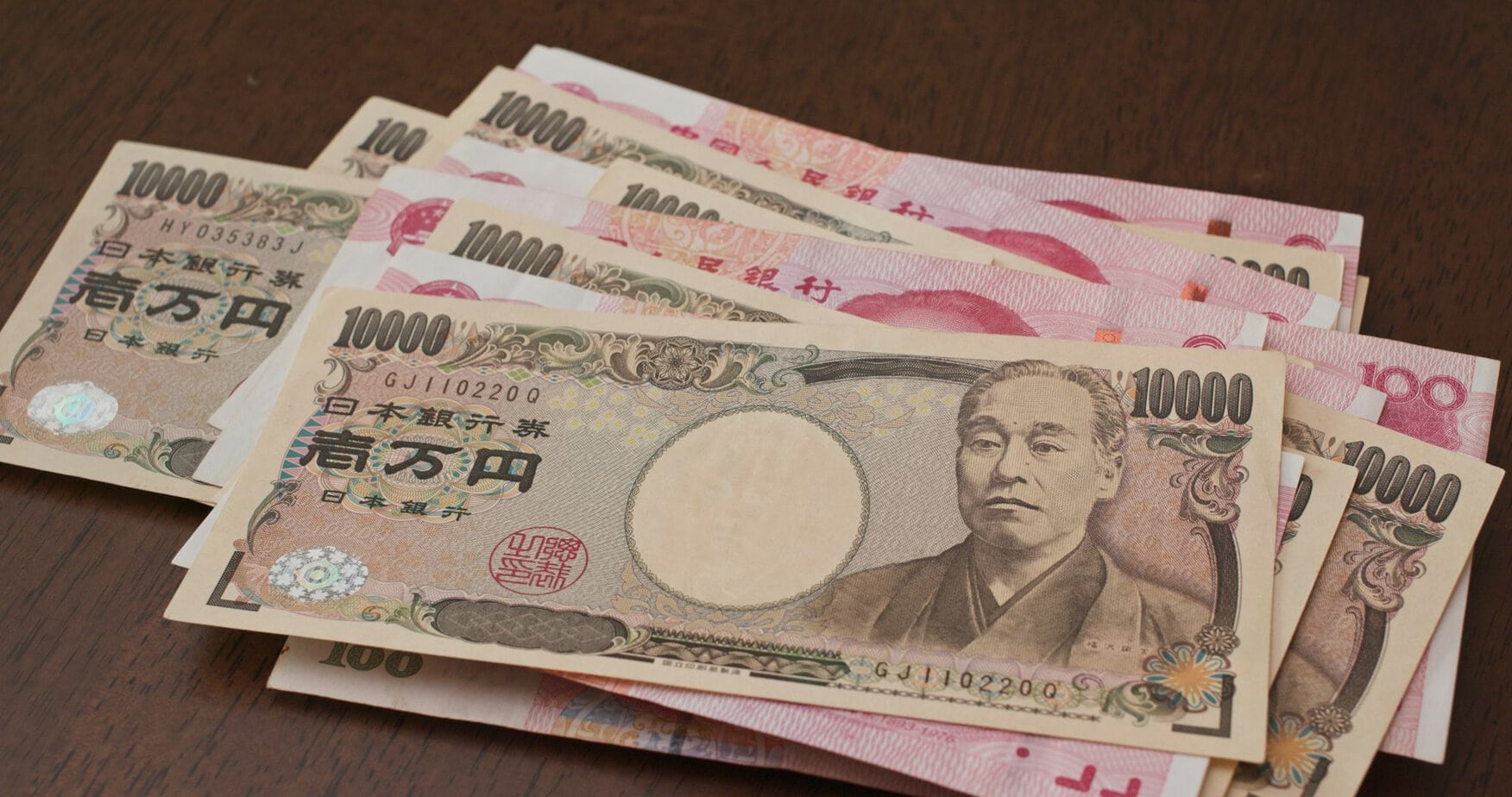 Chinese RMB banknote and Japanese Yen