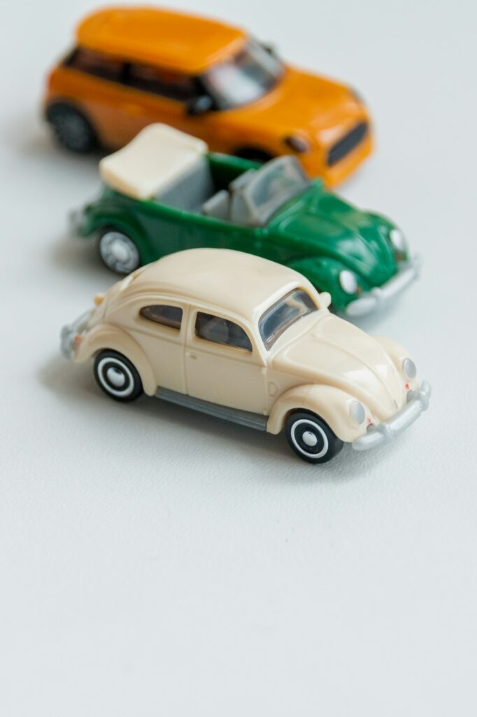 Russia, Saint-Petersburg, February 28, 2019. Toy Volkswagen Beetle,Miniature car toys on white